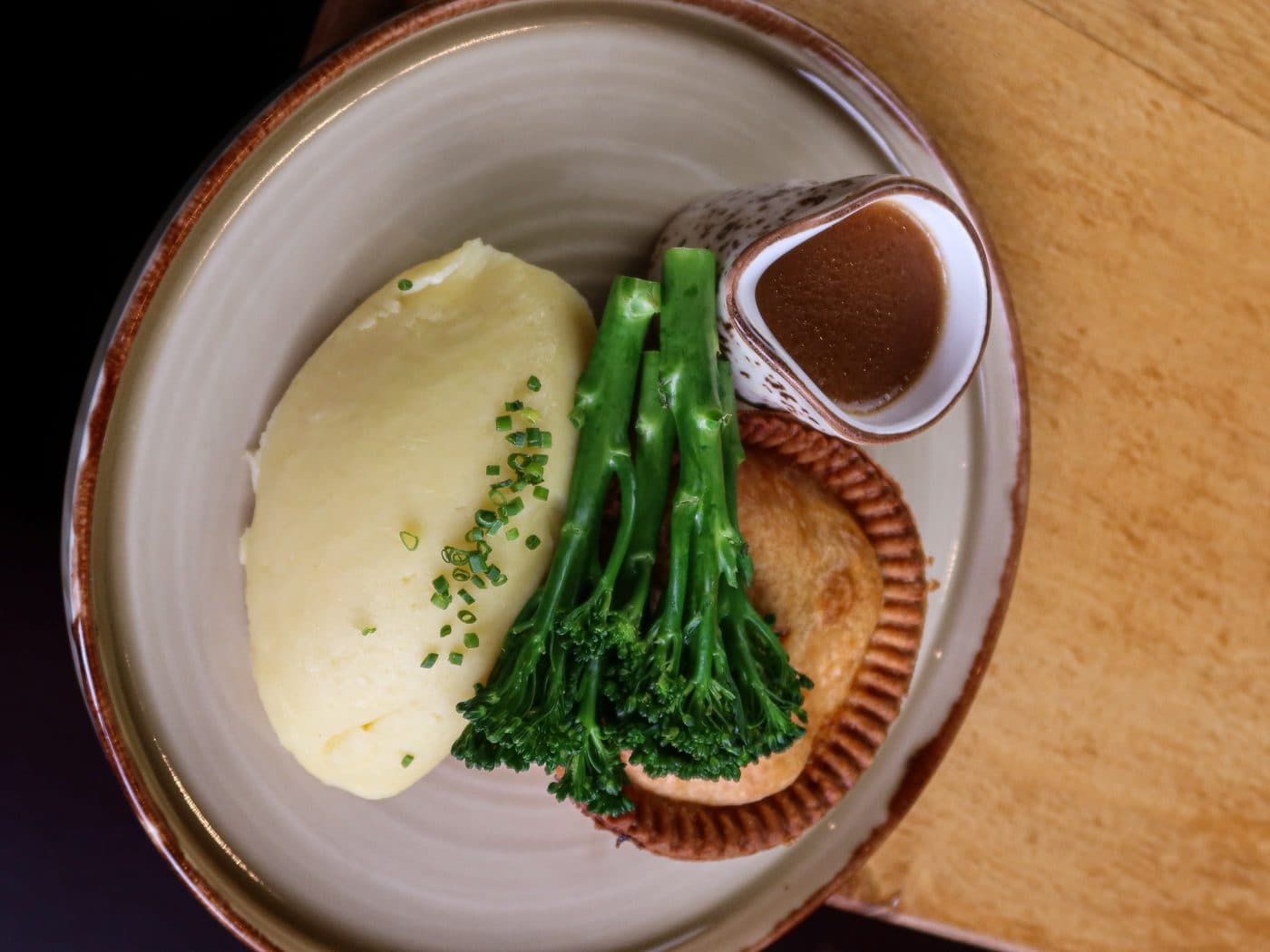 Chicken, leek and ham pie with mash and Tenderstem