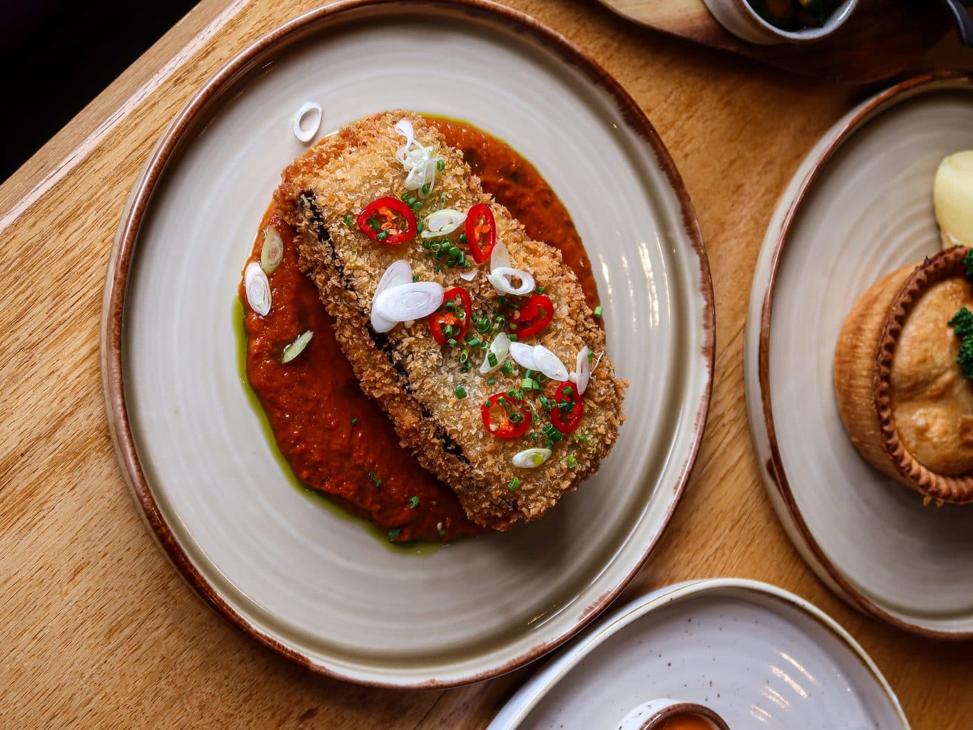 Aubergine schnitzel with tandoori sauce